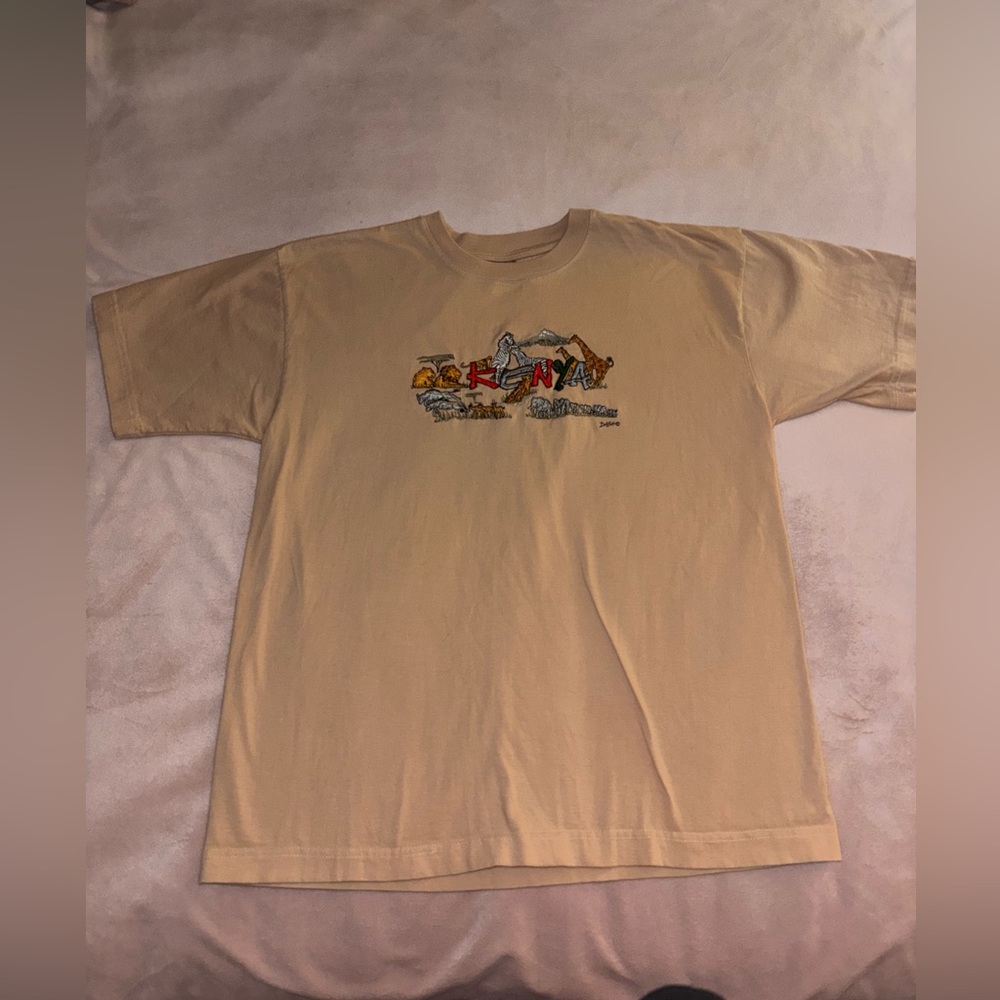 Dash 110 adult med/large embroidered Kenya tan shirt